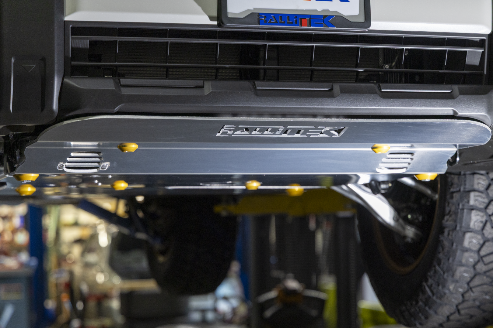Close-up of a vehicle's undercarriage 2026 Outback Wilderness with Skid Plates Installed