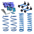 A 2-inch suspension lift kit for a Subaru Outback Wilderness, including blue coil springs and metal components.